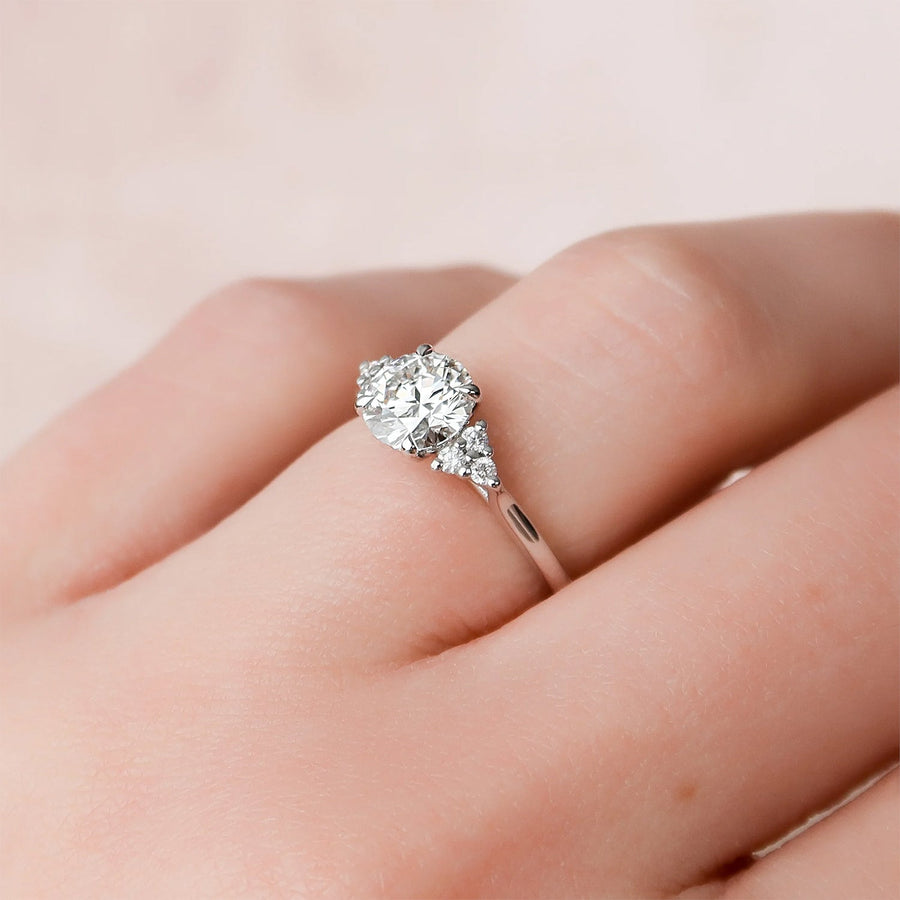The Side Stone Catharina Round Solitaire Moissanite Ring - KNT - Engagement Rings, Wedding Bands & Fine Jewelry