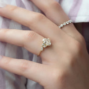 The Side Stone Daisy Oval Moissanite Ring - KNT - Engagement Rings, Wedding Bands & Fine Jewelry