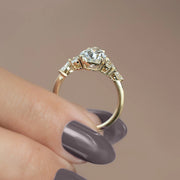 The Side Stone Daisy Pear Moissanite Ring - KNT - Engagement Rings, Wedding Bands & Fine Jewelry