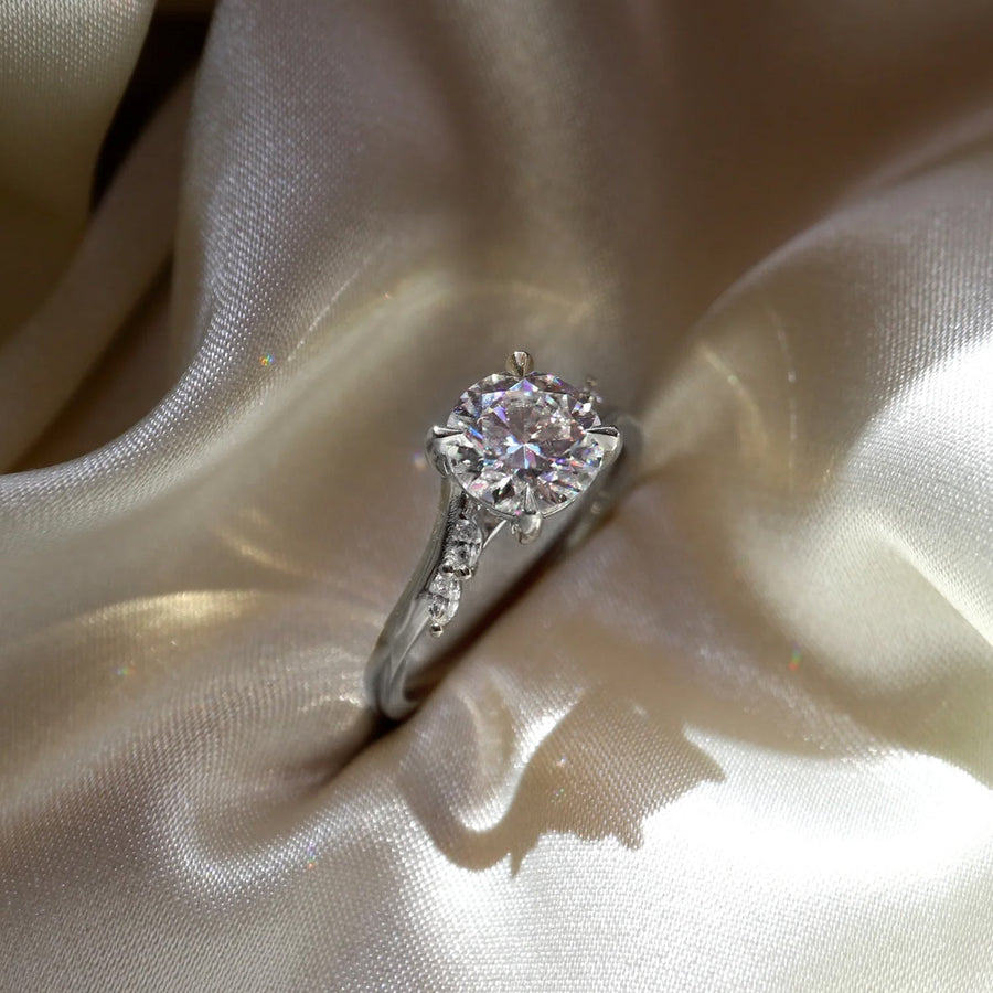 The Side Stone Elara Round Moissanite Ring - KNT - Engagement Rings, Wedding Bands & Fine Jewelry