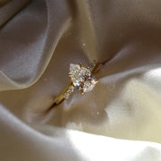 The Side Stone Elara Pear Moissanite Ring - KNT - Engagement Rings, Wedding Bands & Fine Jewelry