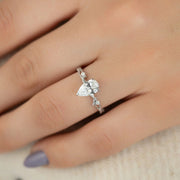 The Coco Pear Side Stone Moissanite Ring - KNT - Engagement Rings, Wedding Bands & Fine Jewelry