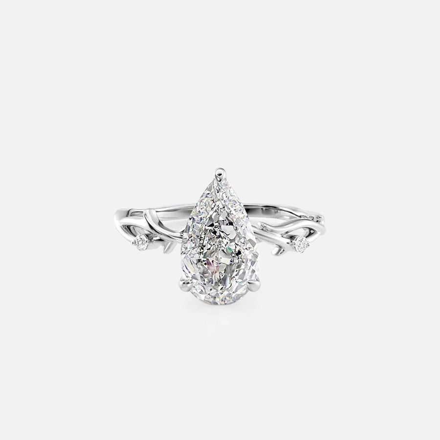 The Coco Pear Side Stone Moissanite Ring - KNT - Engagement Rings, Wedding Bands & Fine Jewelry