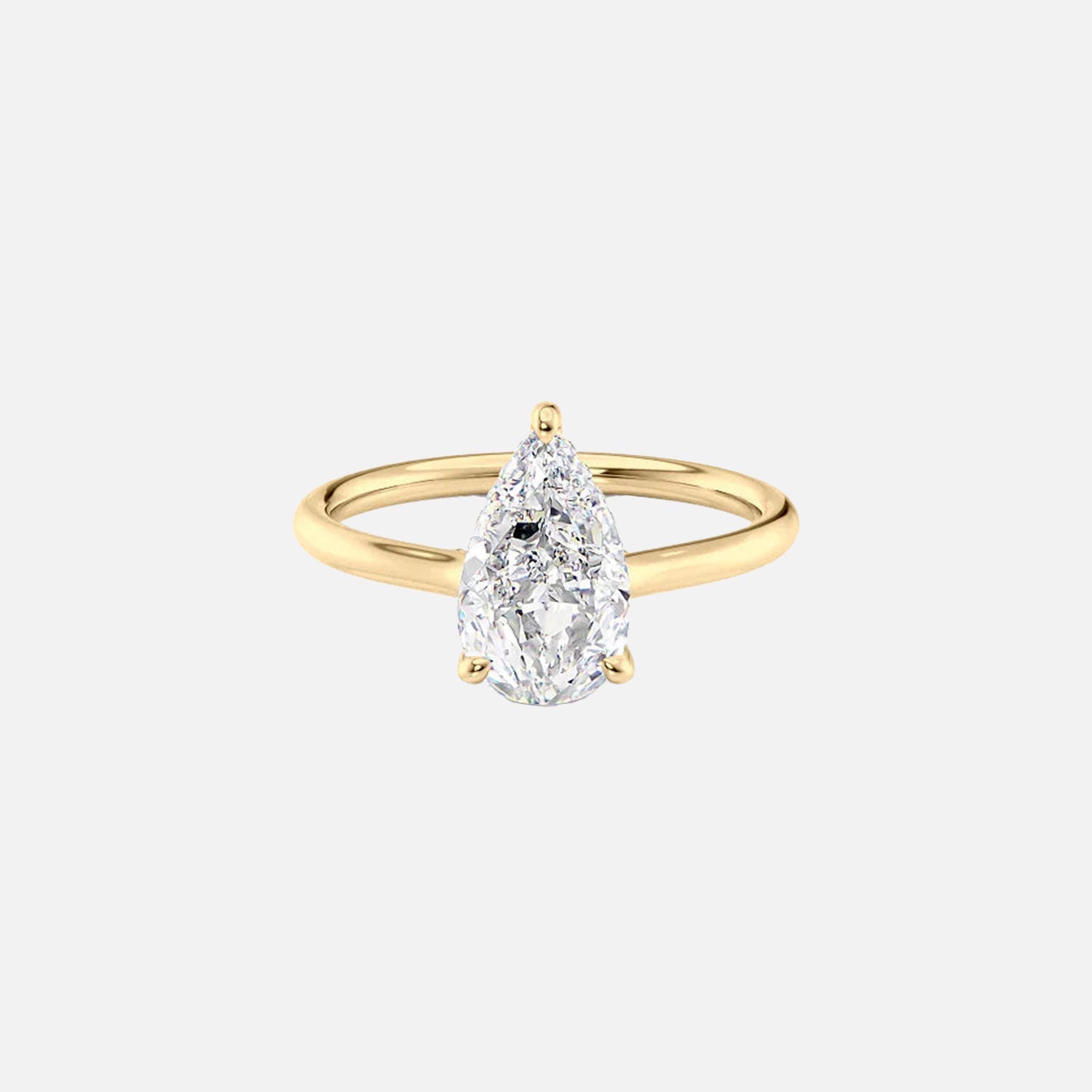 The Ellie Pear Moissanite Ring 14k Yellow Gold 001