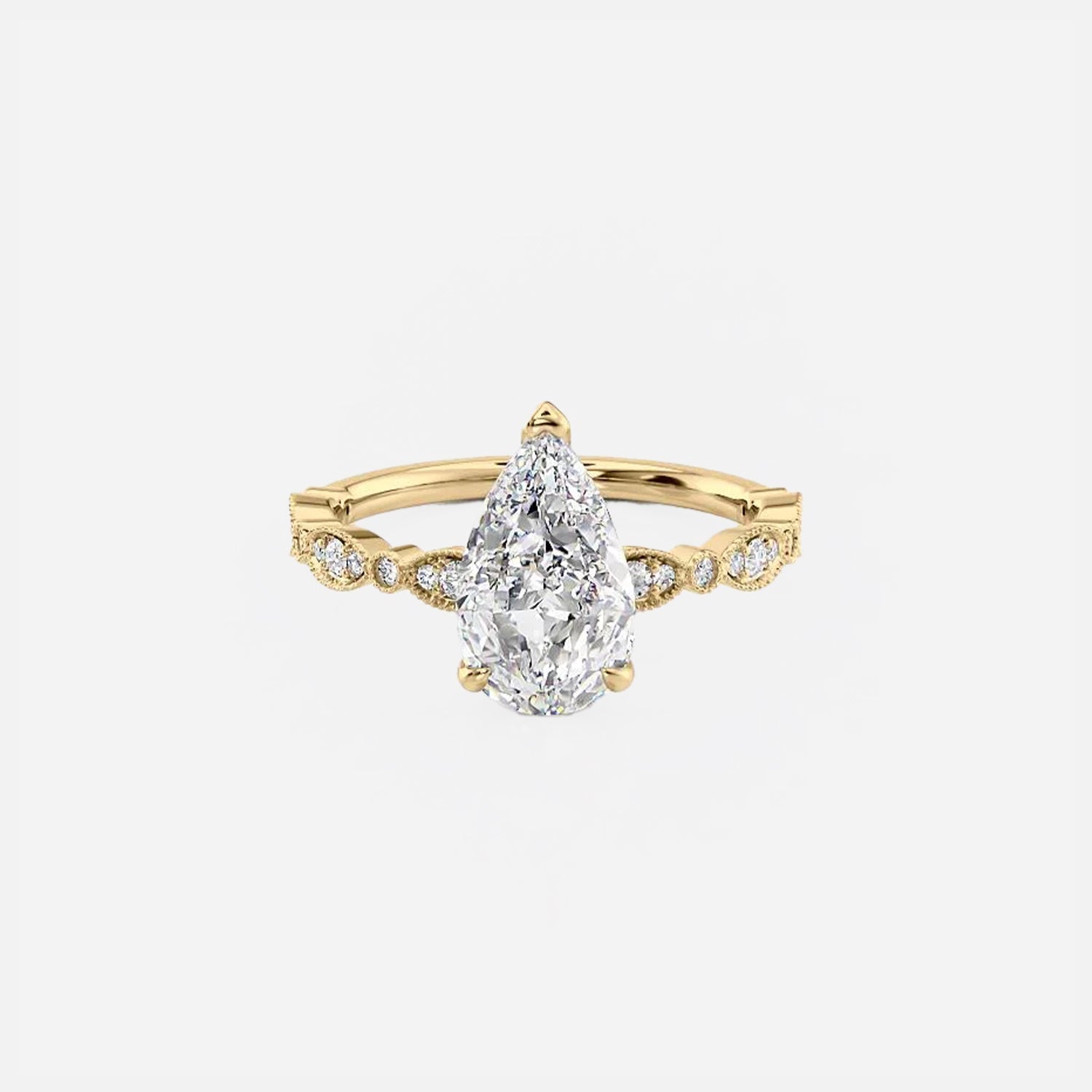The Jasmine Pear Moissanite Ring 14k Yellow Gold 001