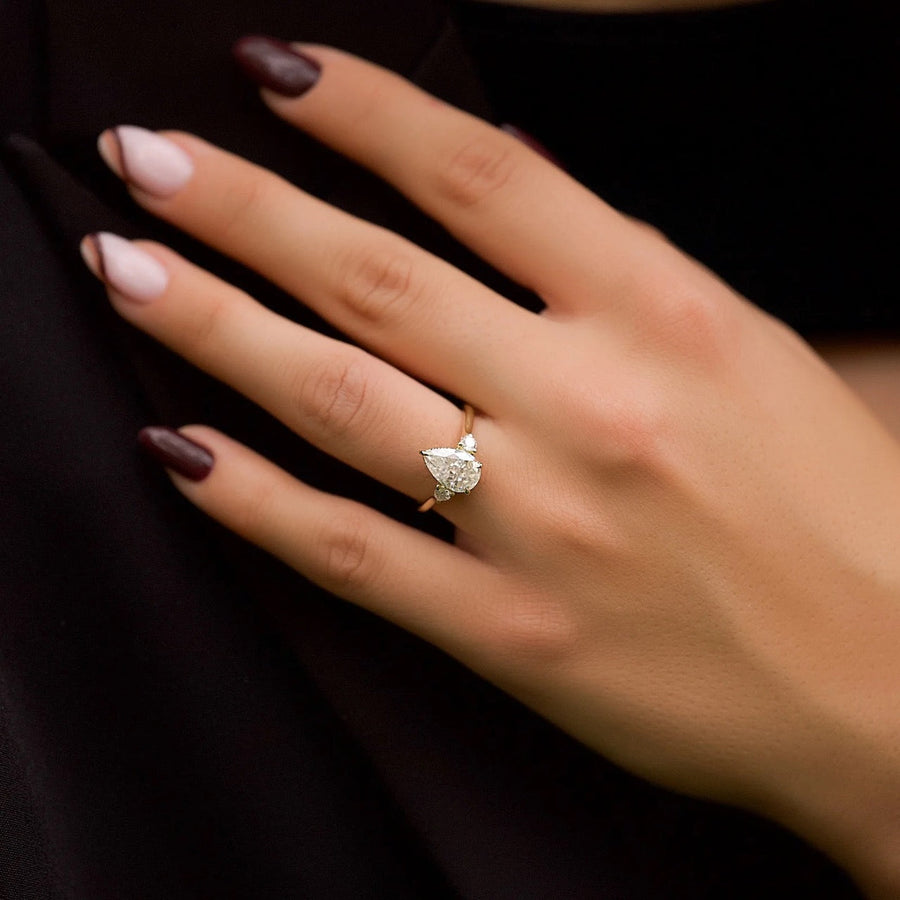  The Lia Pear Moissanite Ring 18k Yellow Gold 003