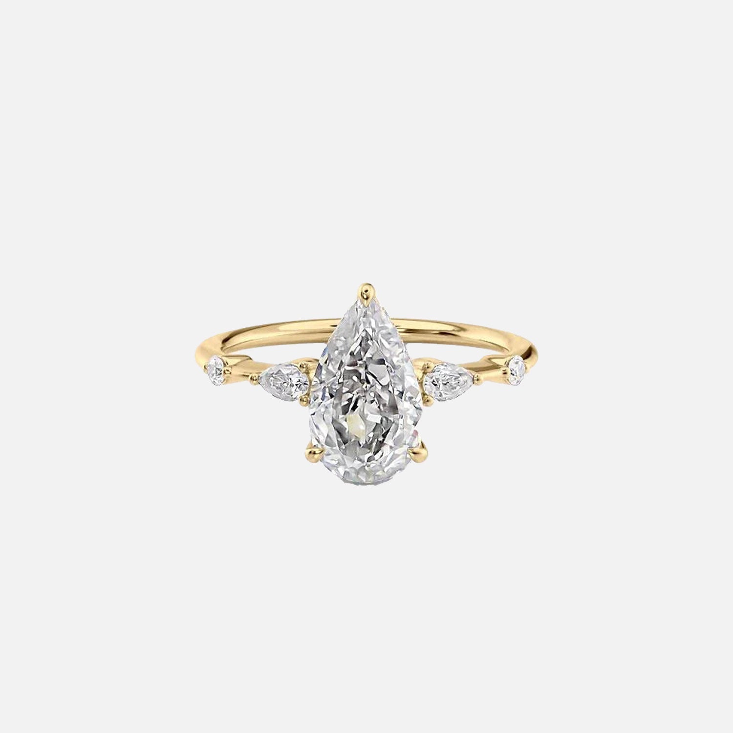 The Naomi Pear Moissanite Ring 14k Yellow Gold 001