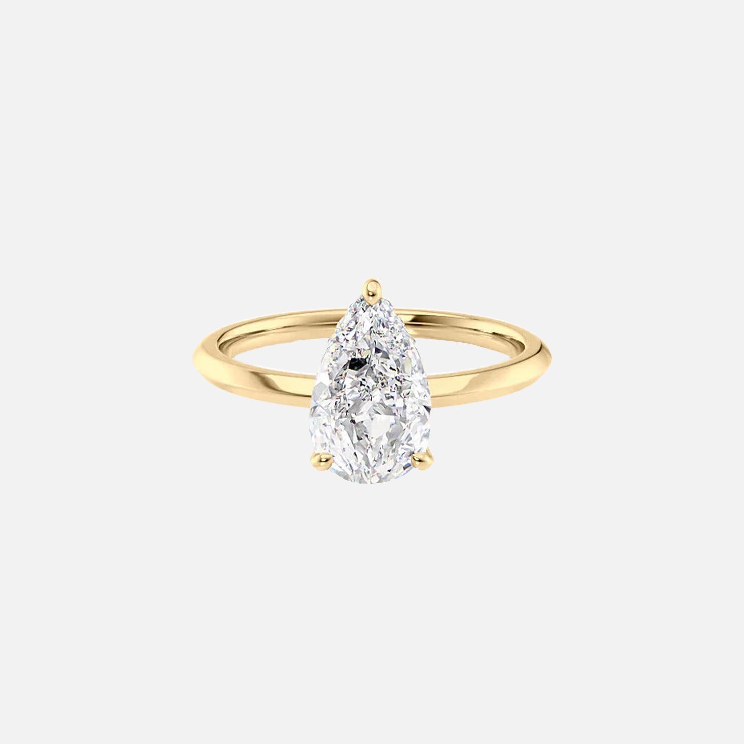 The Razor Kamellie Pear Moissanite Ring 14k Yellow Gold 001
