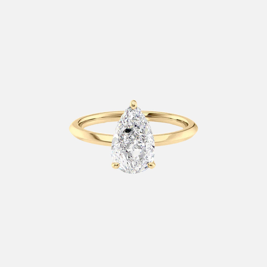 The Razor Kamellie Pear Moissanite Ring 14k Yellow Gold 001