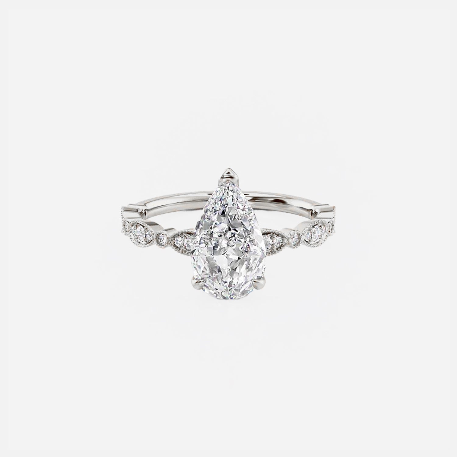 The Side Stone Zanessa Pear Moissanite Ring - KNT - Engagement Rings, Wedding Bands & Fine Jewelry