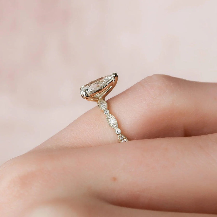 The Side Stone Zanessa Pear Moissanite Ring - KNT - Engagement Rings, Wedding Bands & Fine Jewelry