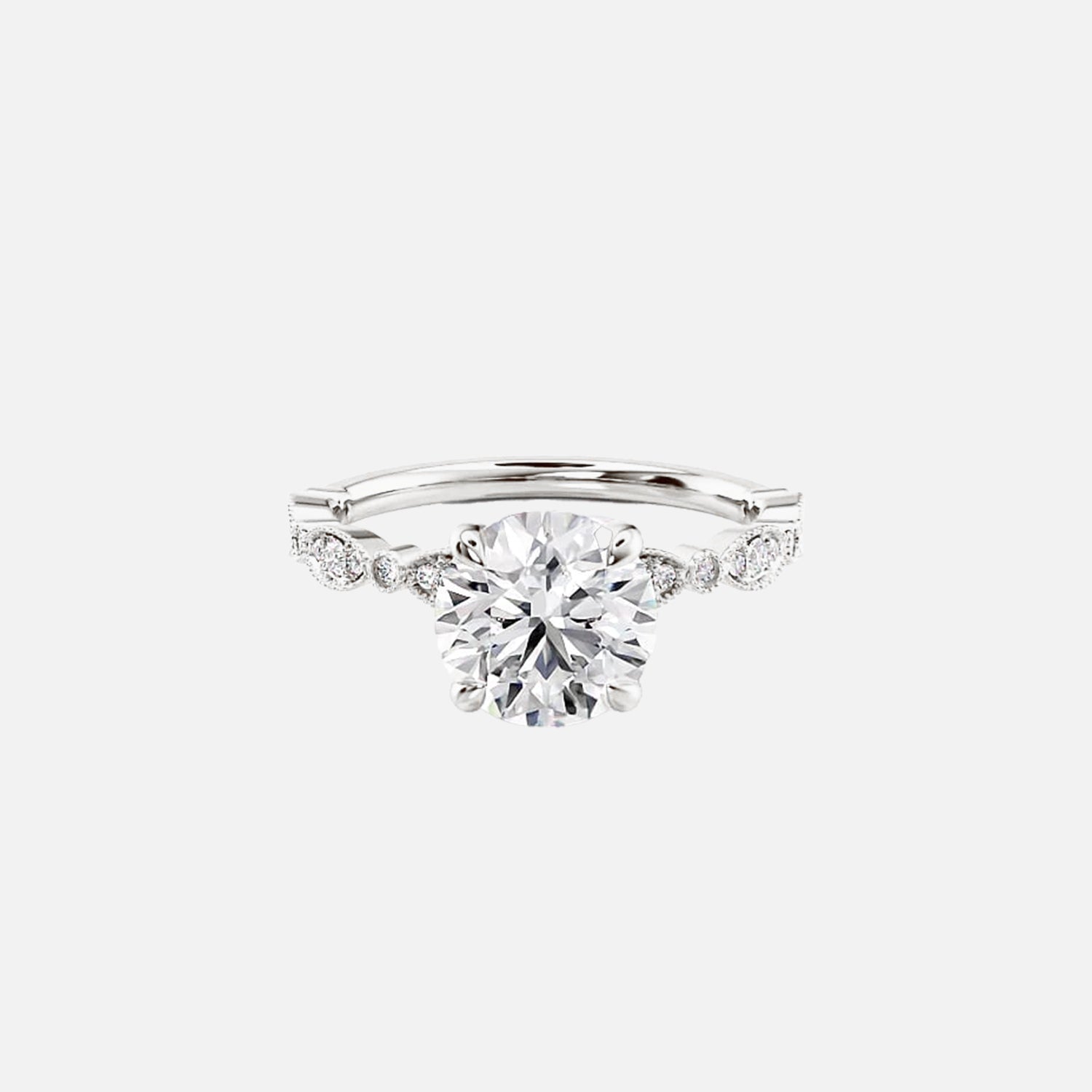 The Side Stone Zanessa Round Moissanite Ring - KNT - Engagement Rings, Wedding Bands & Fine Jewelry