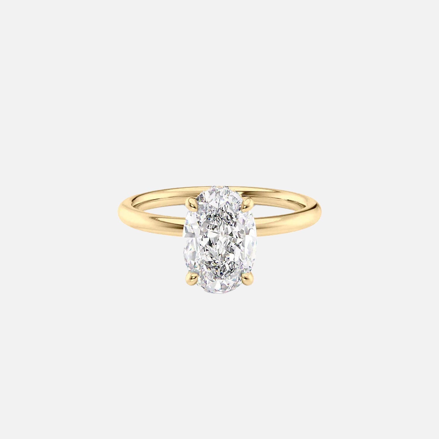The Solitaire Alex Oval Moissanite Ring 14k Yellow Gold 001