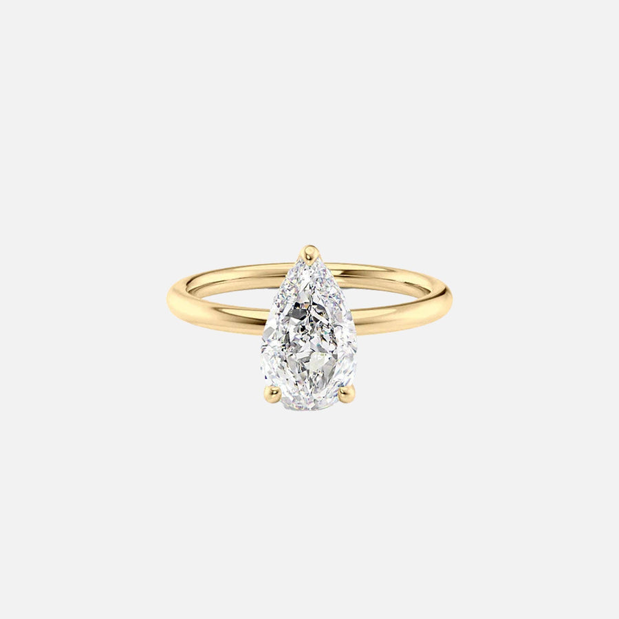 The Solitaire Alex Pear Moissanite Ring 14k Yellow Gold 001
