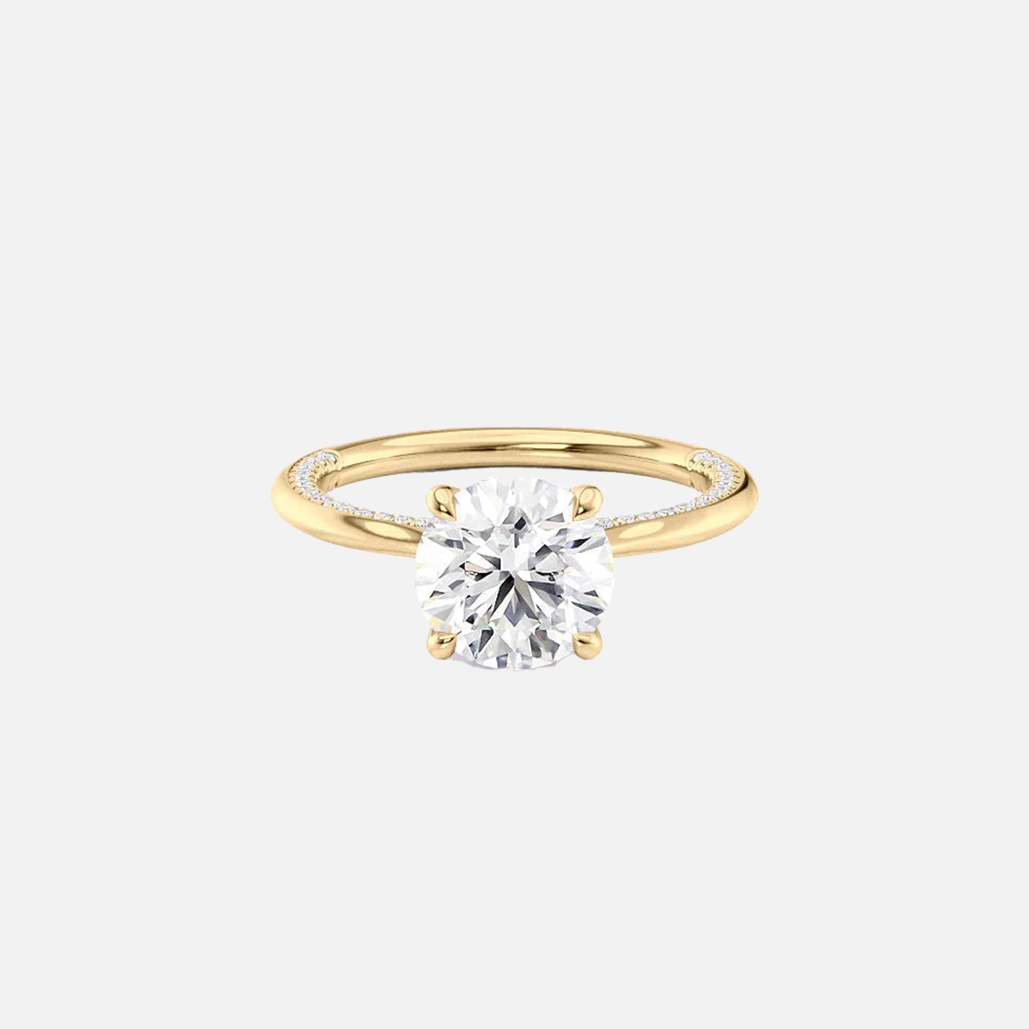 The Solitaire Claire Round Moissanite Ring 14k Yellow Gold 001