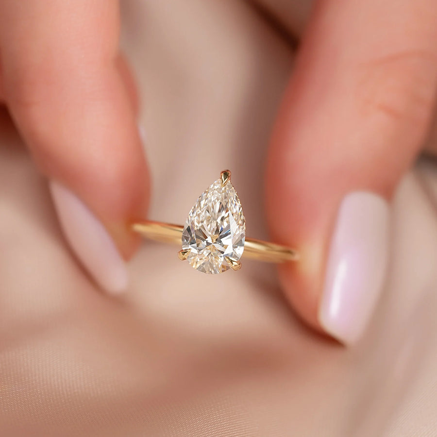  The Solitaire Crown Kamellie Pear Moissanite Ring 14k Yellow Gold 004 Final