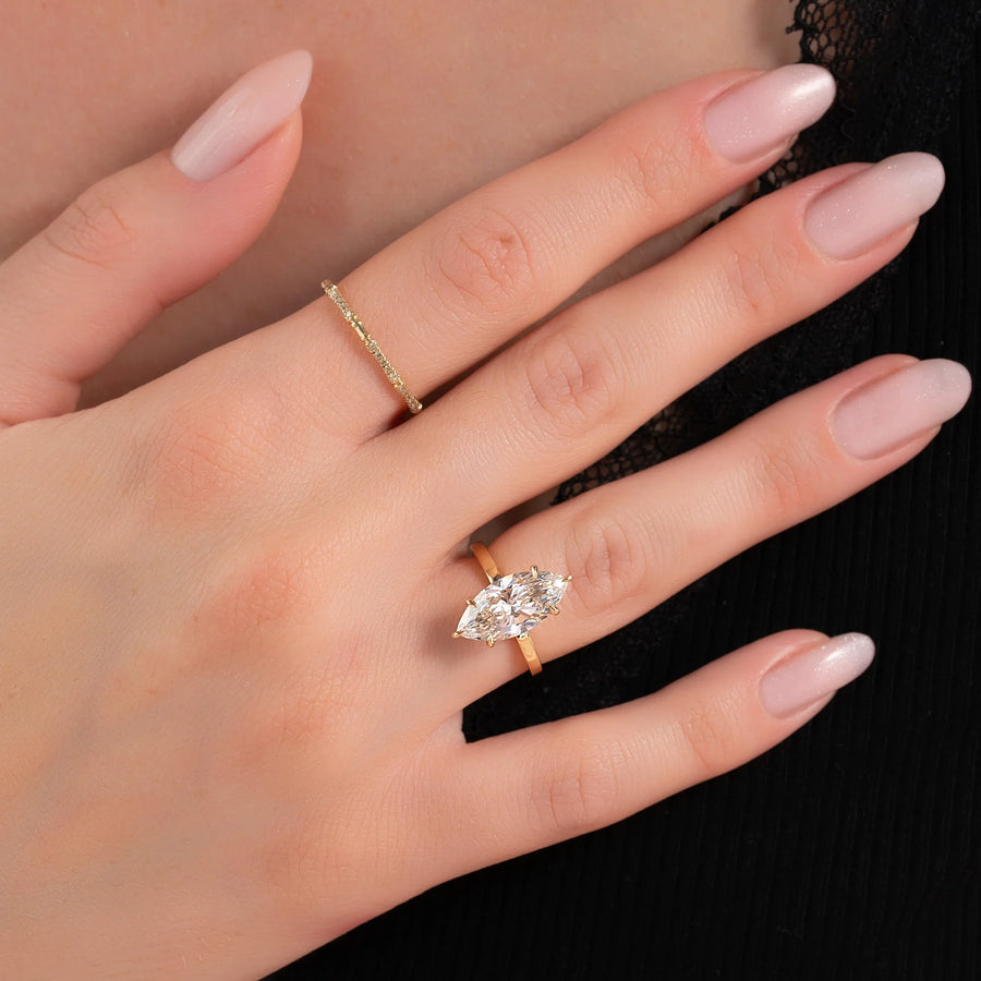  The Solitaire Eleanor Marquise Moissanite Ring 18k Yellow Gold 003