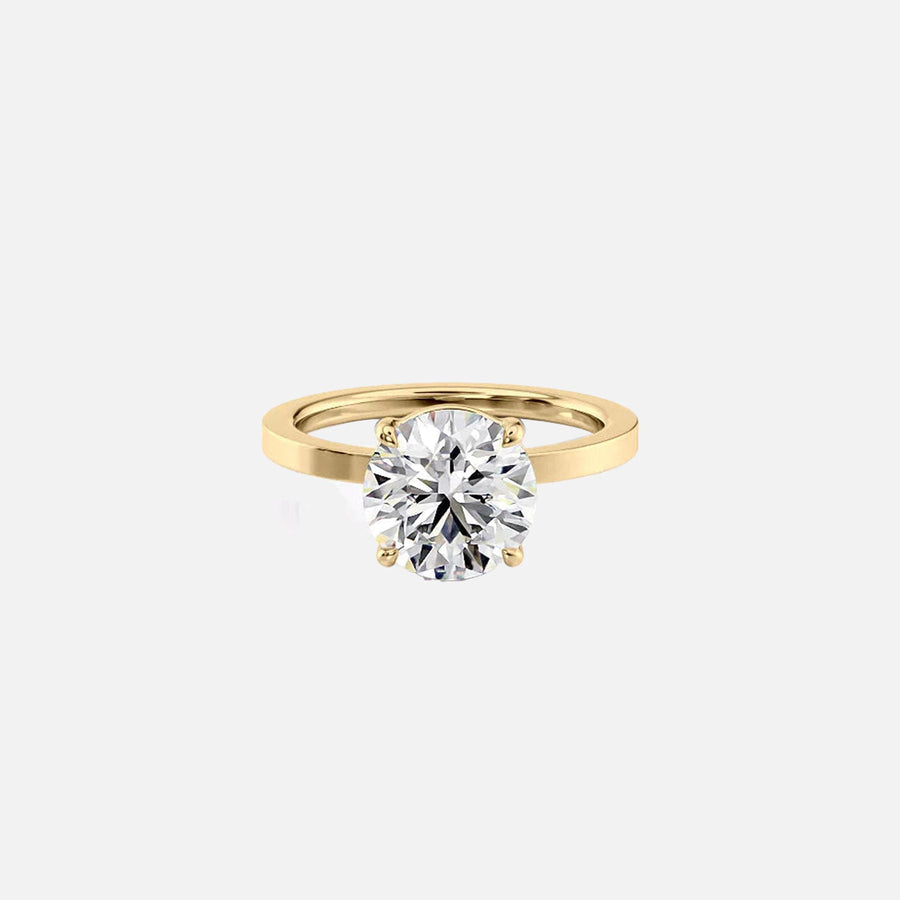 The Solitaire Eleanor Round Moissanite Ring 14k Yellow Gold 001