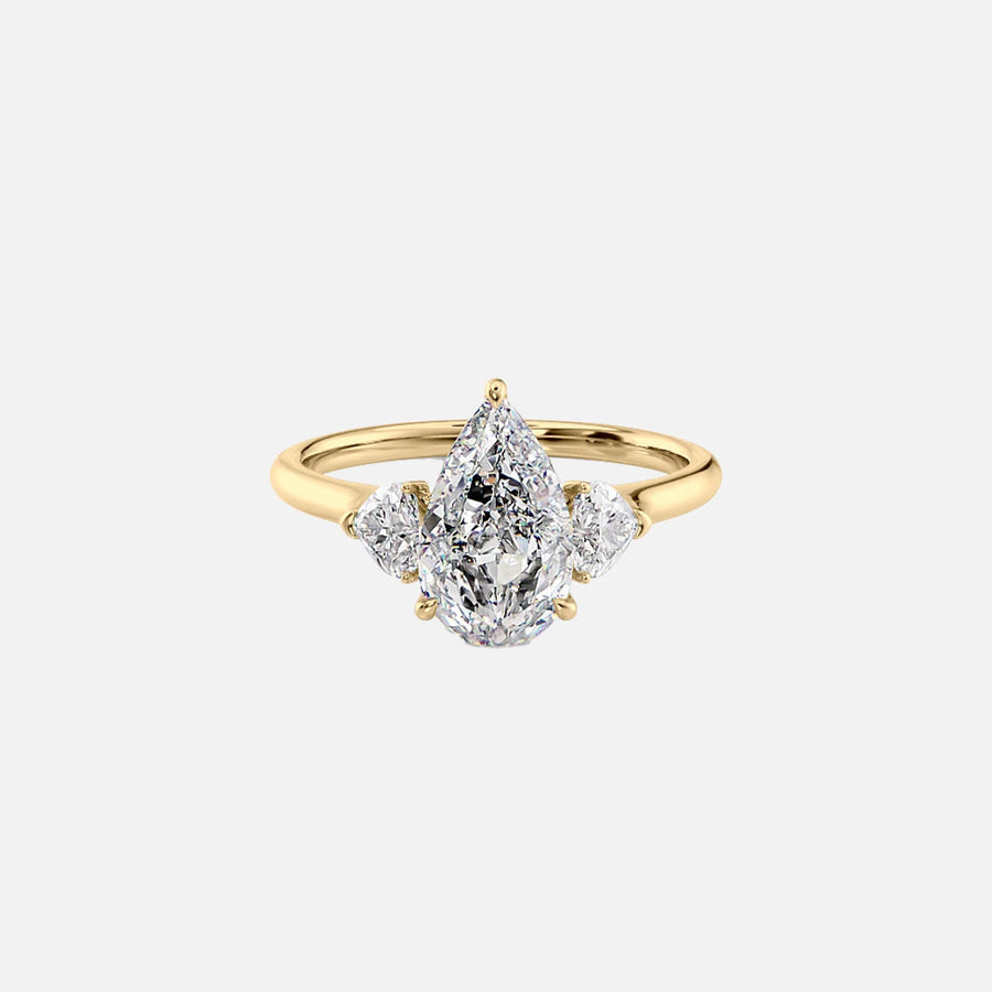 The Solitaire Hearts Liv Pear Moissanite Ring 14k Yellow Gold 001