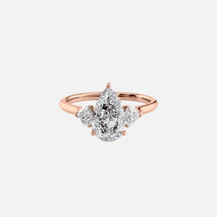  The Solitaire Hearts Liv Pear Moissanite Ring 18k Rose Gold 001