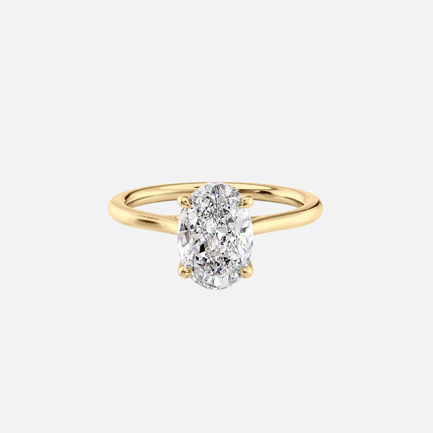 The Solitaire Lexie Oval Moissanite Ring 14k Yellow Gold 001