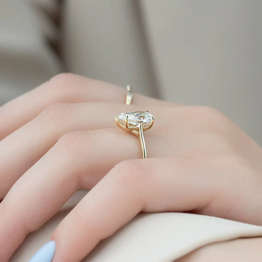  The Solitaire Lexie Pear Moissanite Ring 18k Yellow Gold 005 Final