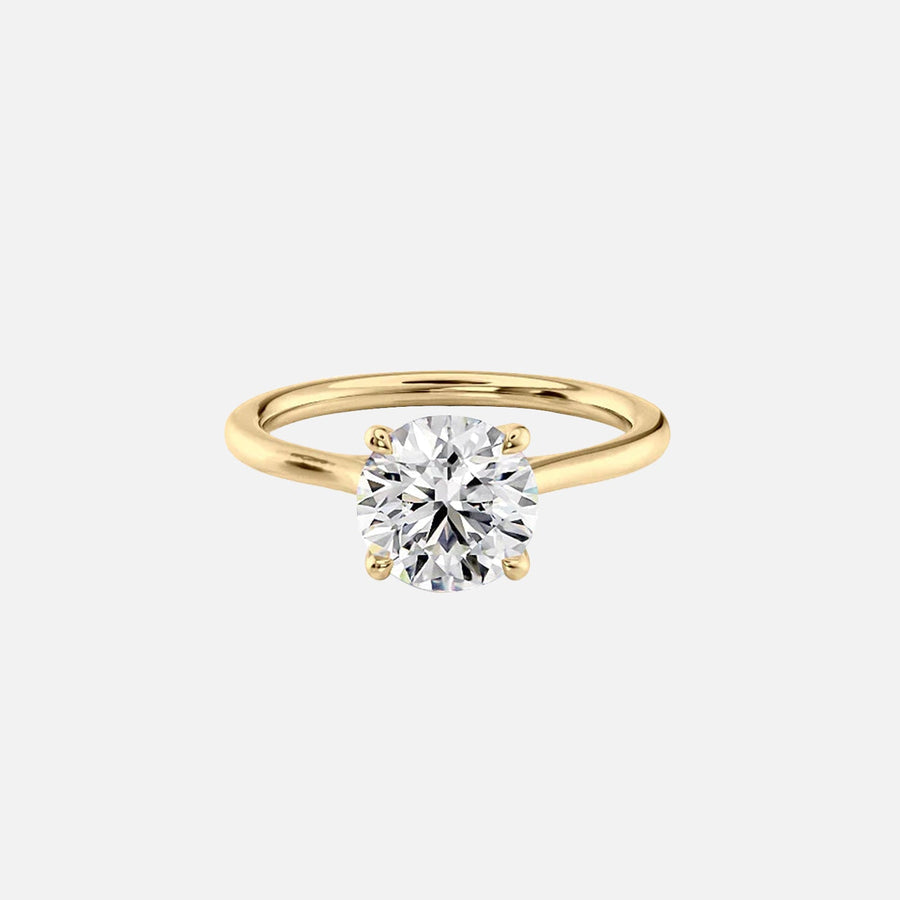 The Solitaire Lexie Round Moissanite Ring 14k Yellow Gold 001