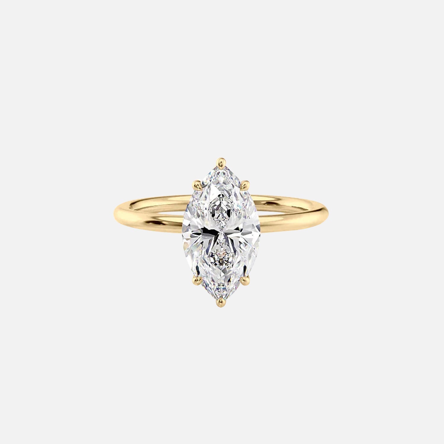 The Solitaire Lily Marquise Moissanite Ring 14k Yellow Gold 001