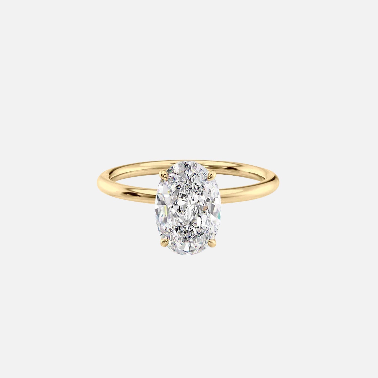 The Solitaire Lily Oval Moissanite Ring 14k Yellow Gold 001