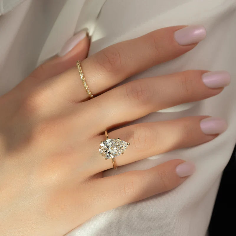  The Solitaire Lily Pear Moissanite Ring 14k Yellow Gold 003
