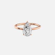  The Solitaire Lily Pear Moissanite Ring 18k Rose Gold 001