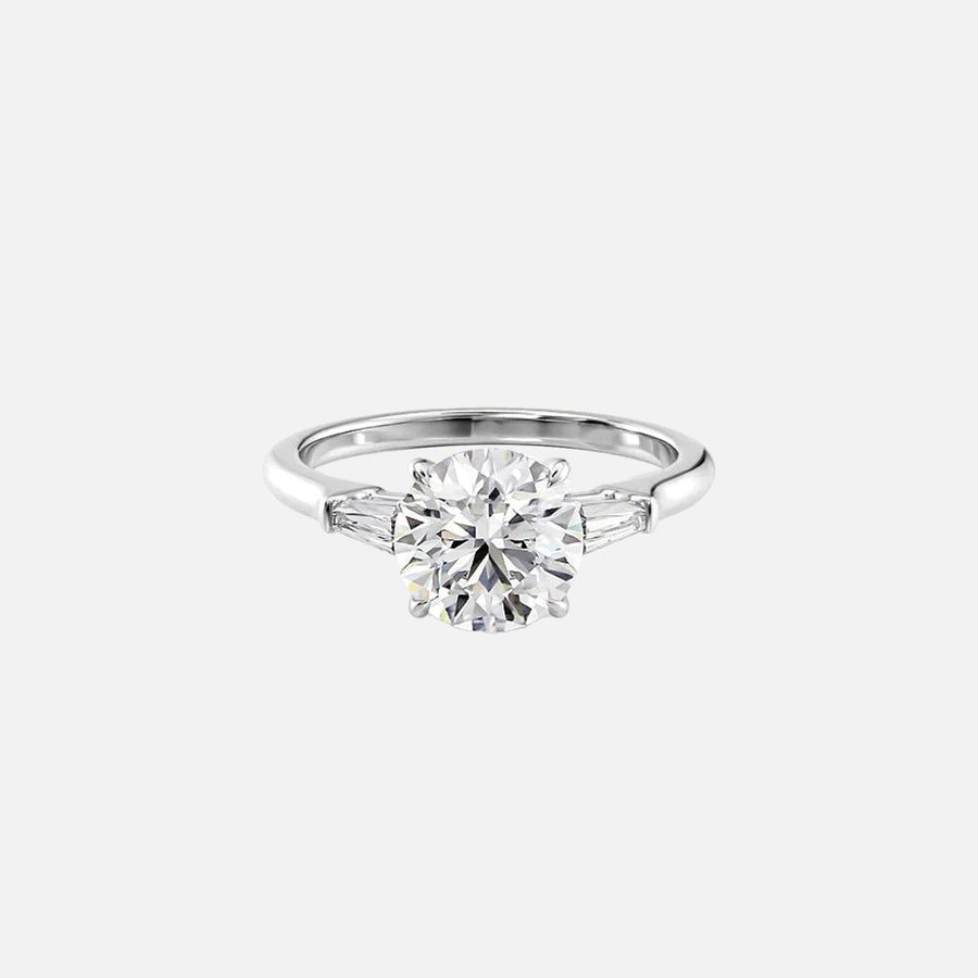  The Solitaire Liv Round Moissanite Ring 18k White Gold 001