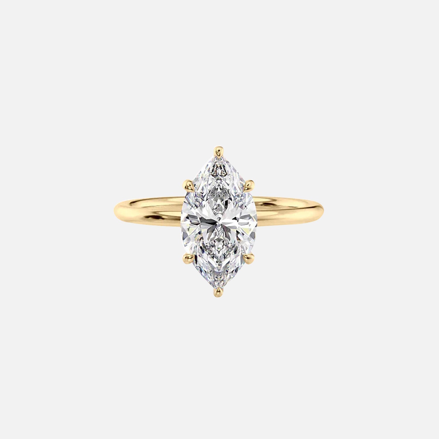 The Solitaire Low Profile Kamellie Marquise Moissanite Ring 14k Yellow Gold 001