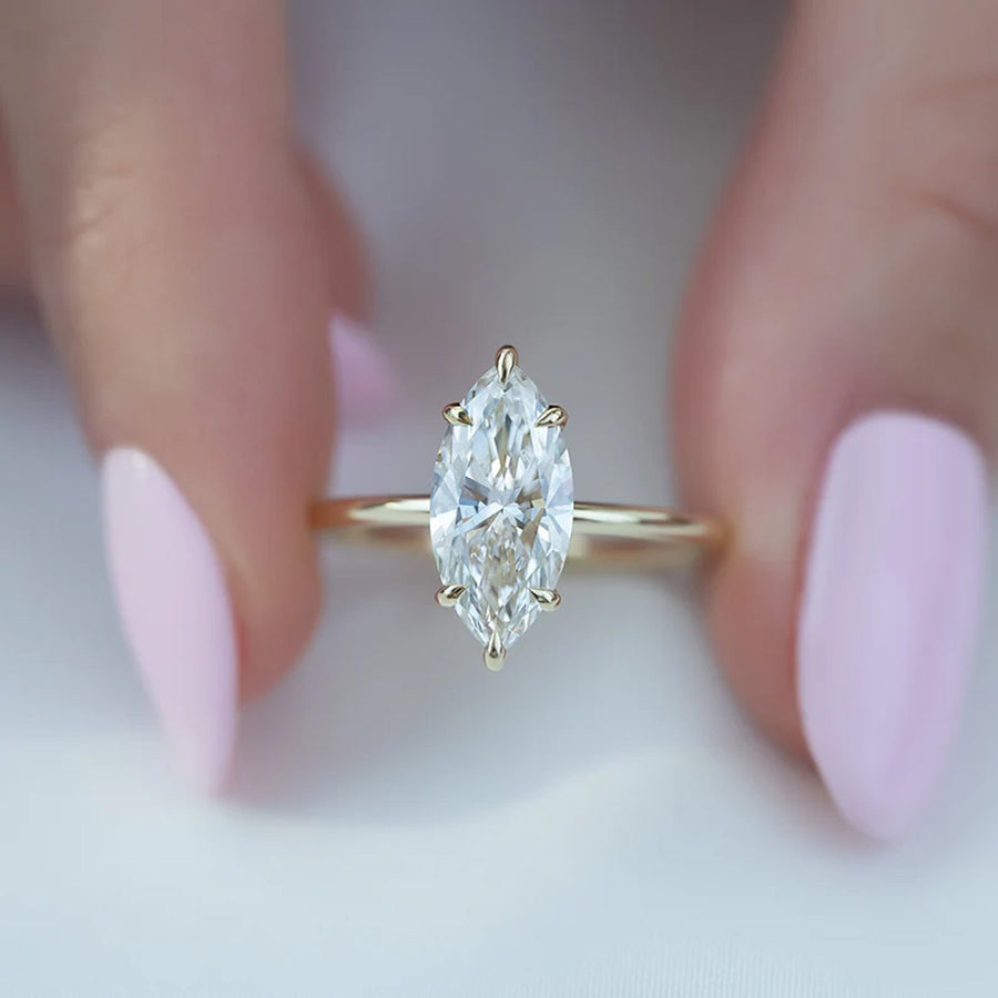  The Solitaire Low Profile Kamellie Marquise Moissanite Ring 18k Yellow Gold 004