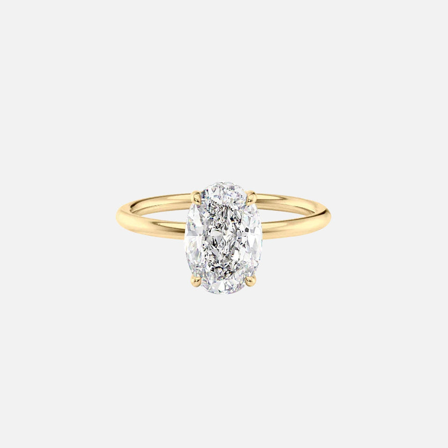  The Solitaire Low Profile Kamellie Oval Moissanite Ring 18k Yellow Gold 001