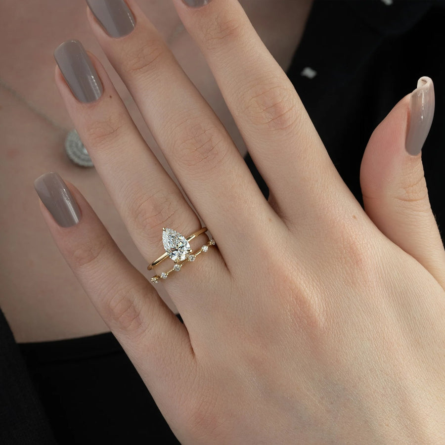  The Solitaire Low Profile Kamellie Pear Moissanite Ring 18k Yellow Gold 005
