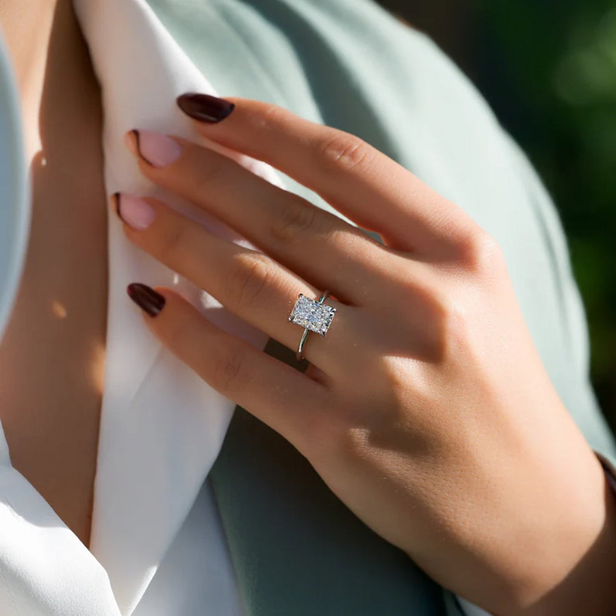  The Solitaire Low Profile Kamellie Radiant Moissanite Ring 14k White Gold 005
