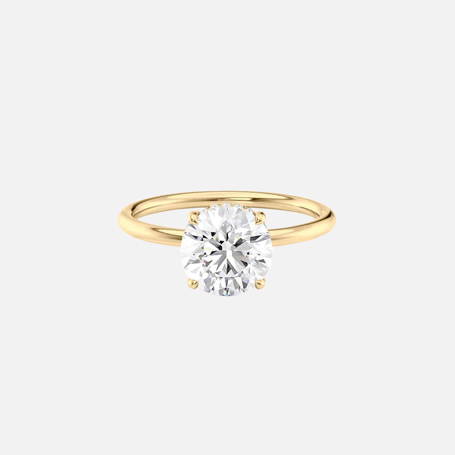 The Solitaire Low Profile Kamellie Round Moissanite Ring 14k Yellow Gold 001