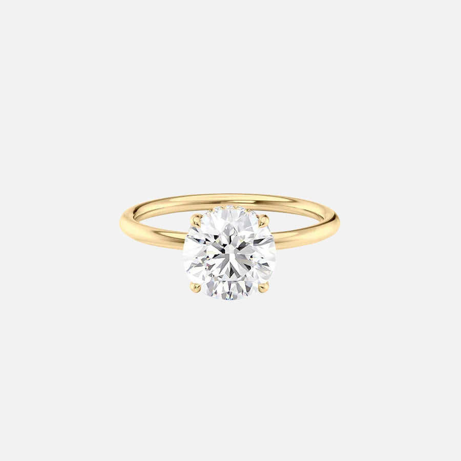 The Solitaire Low Profile Kamellie Round Moissanite Ring 14k Yellow Gold 001