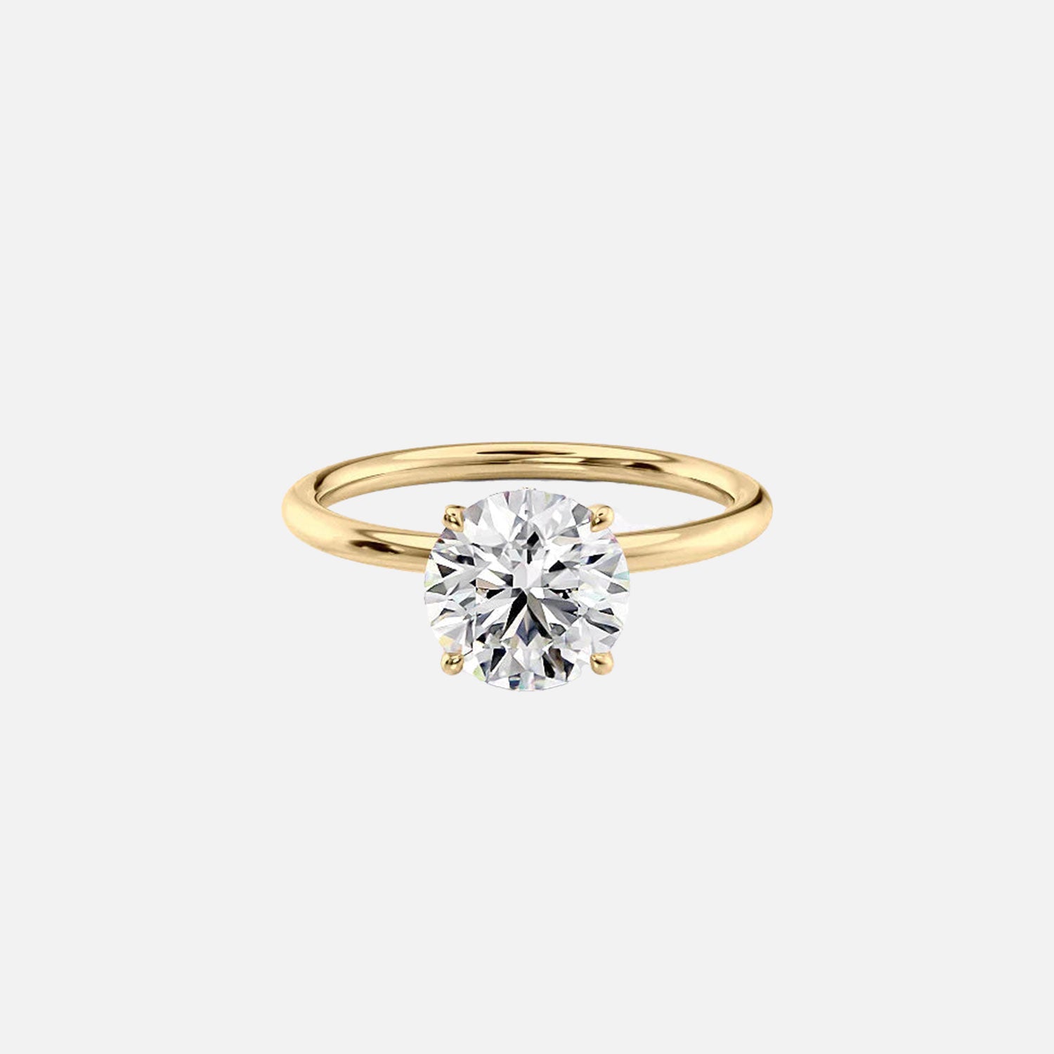 The Solitaire Luna Round Moissanite Ring 14k Yellow Gold 001