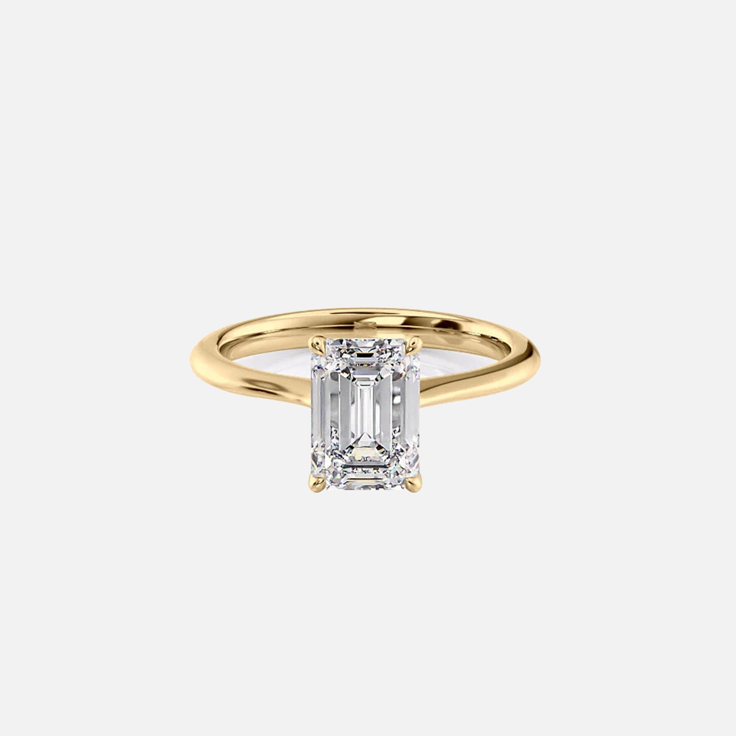 The Solitaire Madison Emerald Moissanite Ring 14k Yellow Gold 001