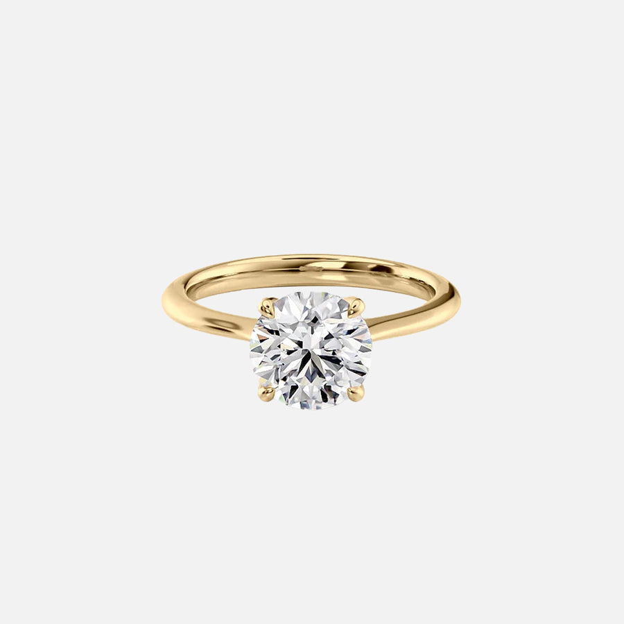 The Solitaire Madison Round Moissanite Ring 14k Yellow Gold 001