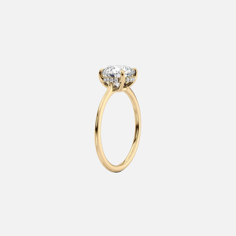  The Solitaire Maia Pear Moissanite Ring 14k Yellow Gold 002