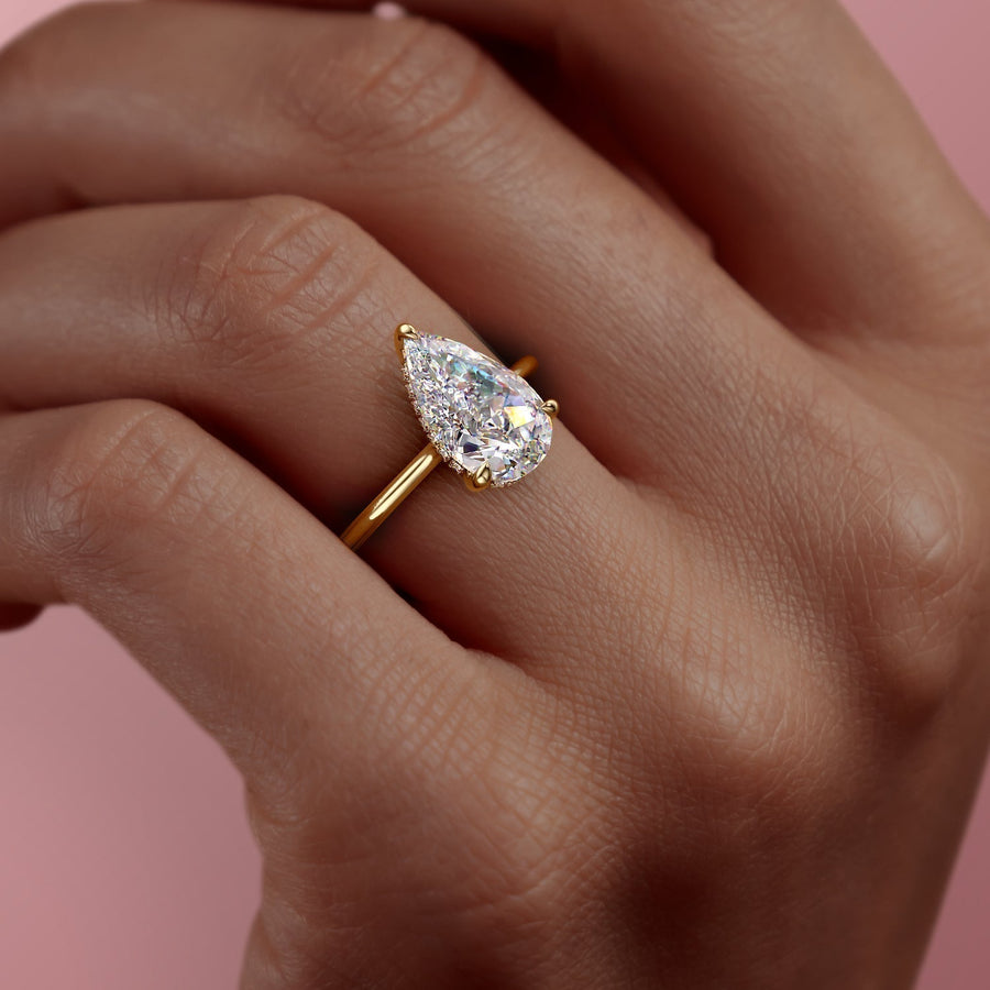  The Solitaire Maia Pear Moissanite Ring 18k Yellow Gold 005 Final