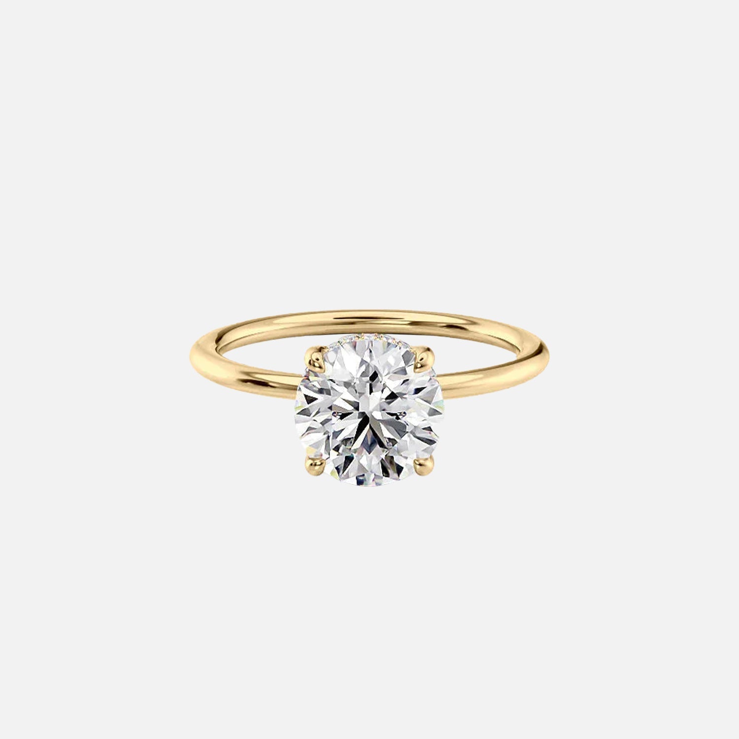 The Solitaire Maia Round Moissanite Ring 14k Yellow Gold 001