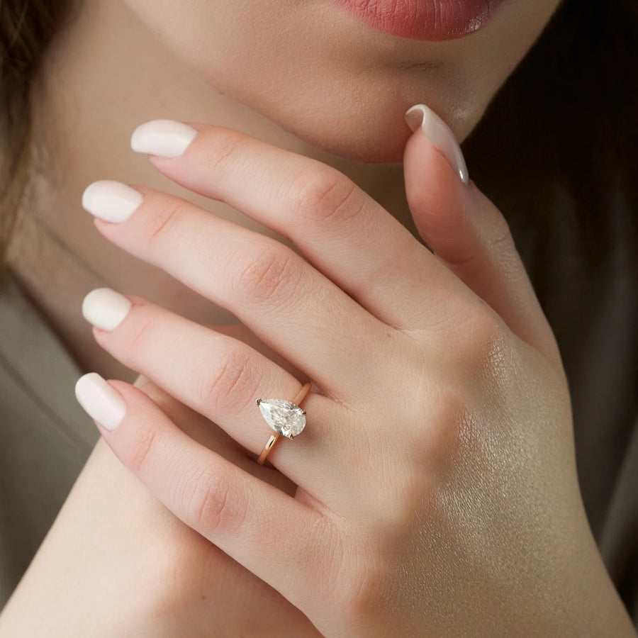  The Solitaire Natalie Pear Moissanite Ring 18k Rose Gold 003