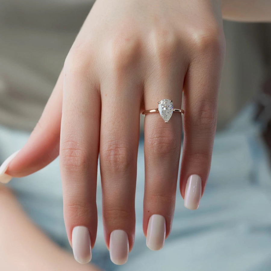 The Solitaire Natalie Pear Moissanite Ring 18k Rose Gold 004