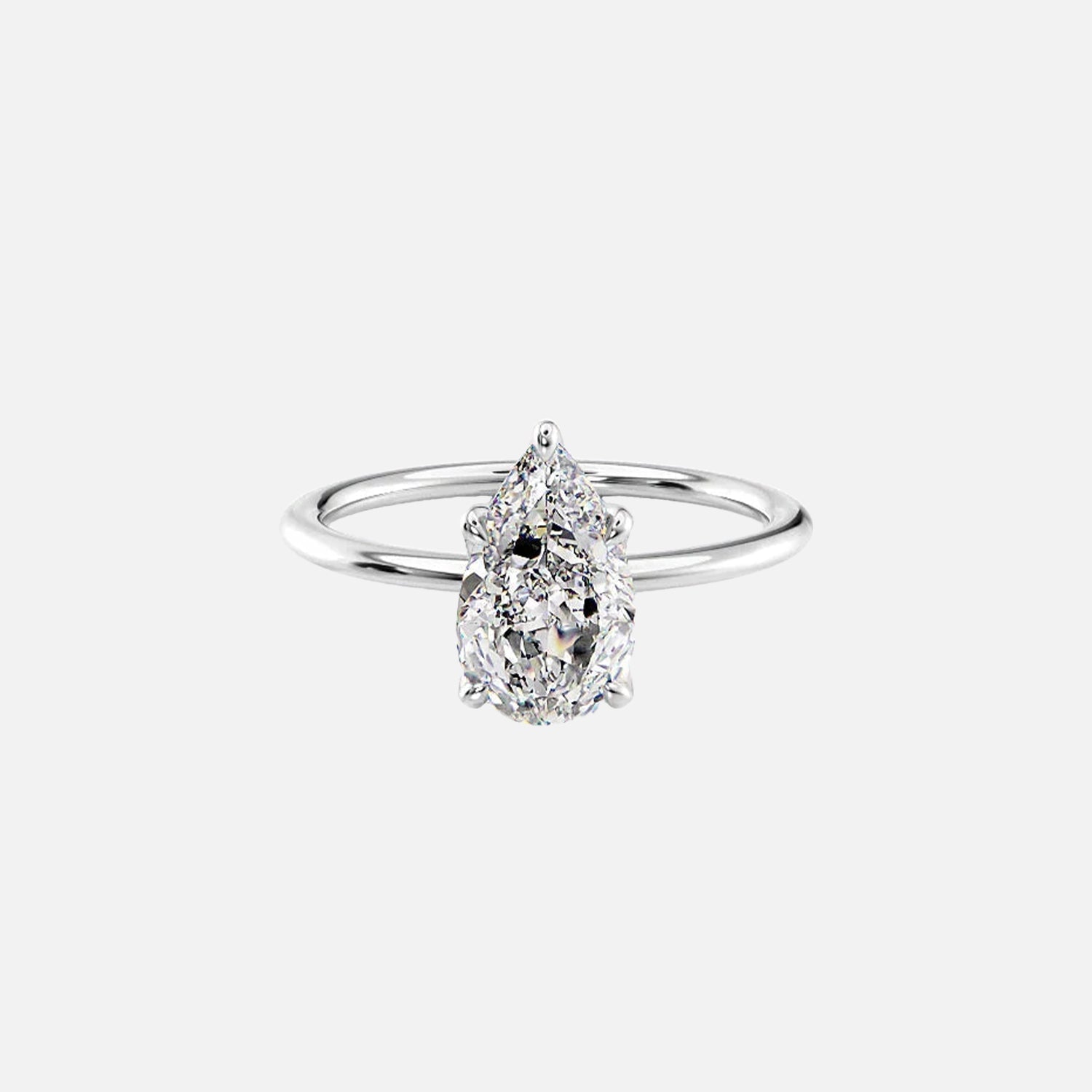  The Solitaire Petal Kamellie Pear Moissanite Ring 14k White Gold 001