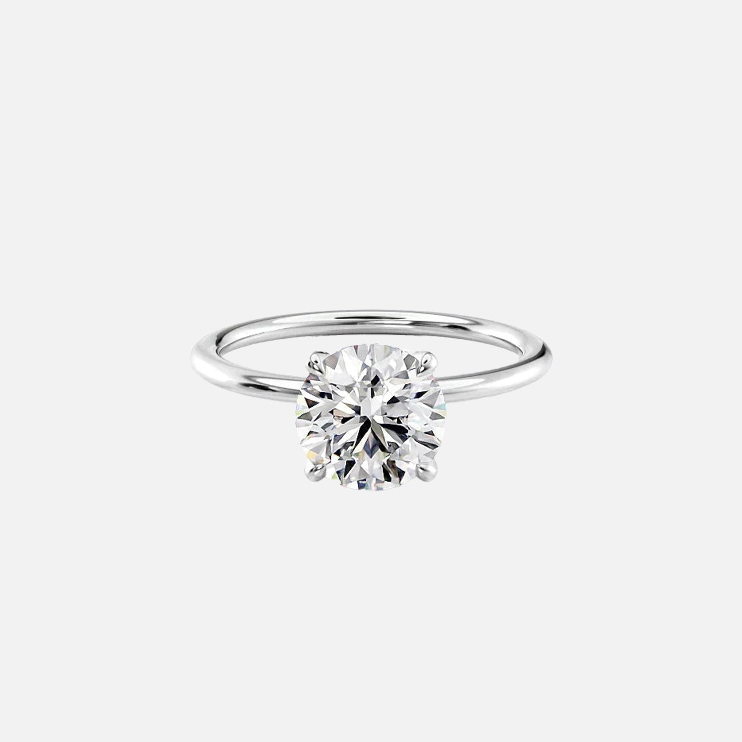  The Solitaire Petal Kamellie Round Moissanite Ring 14k White Gold 001