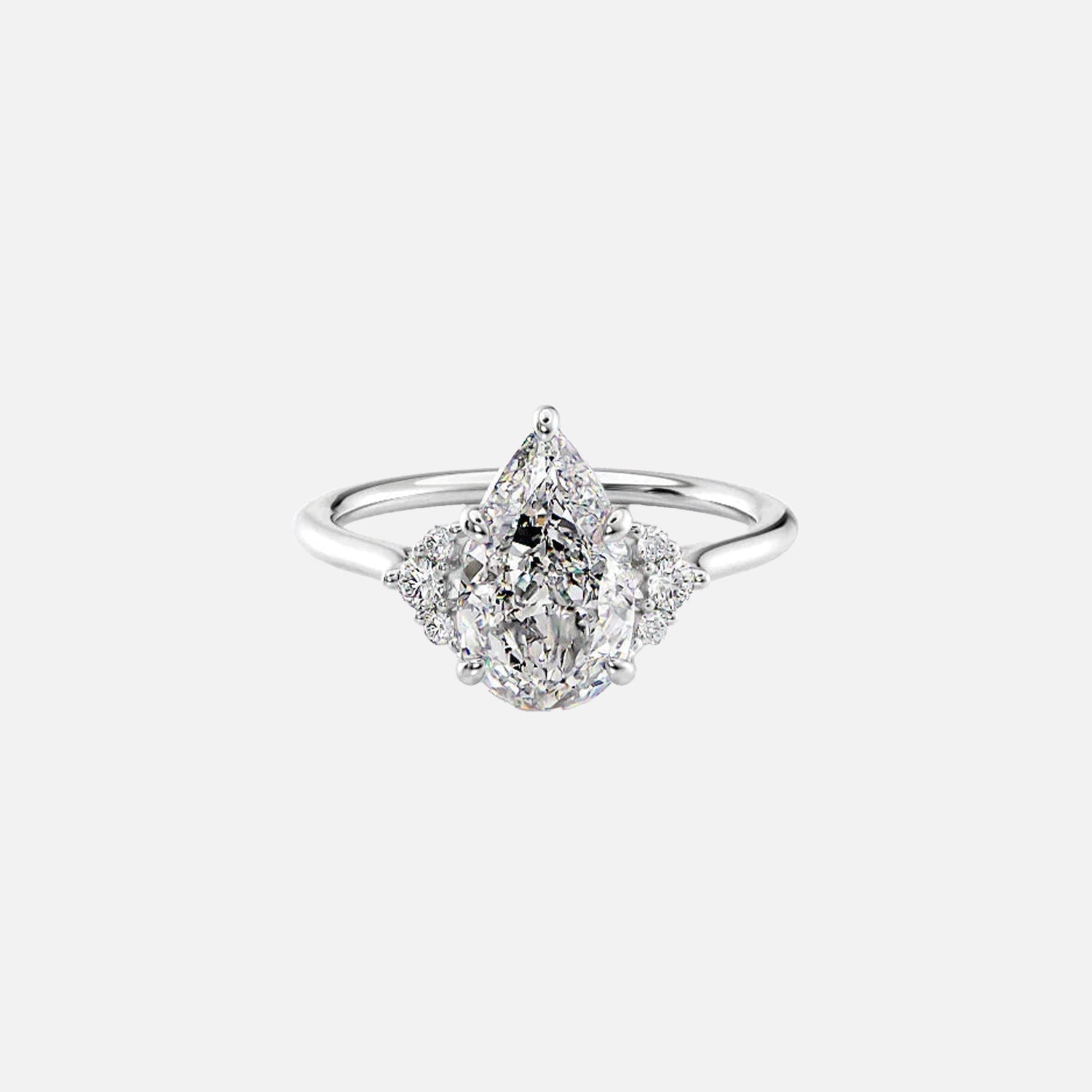 The Violet Pear Side Stone Moissanite Ring - KNT - Engagement Rings, Wedding Bands & Fine Jewelry